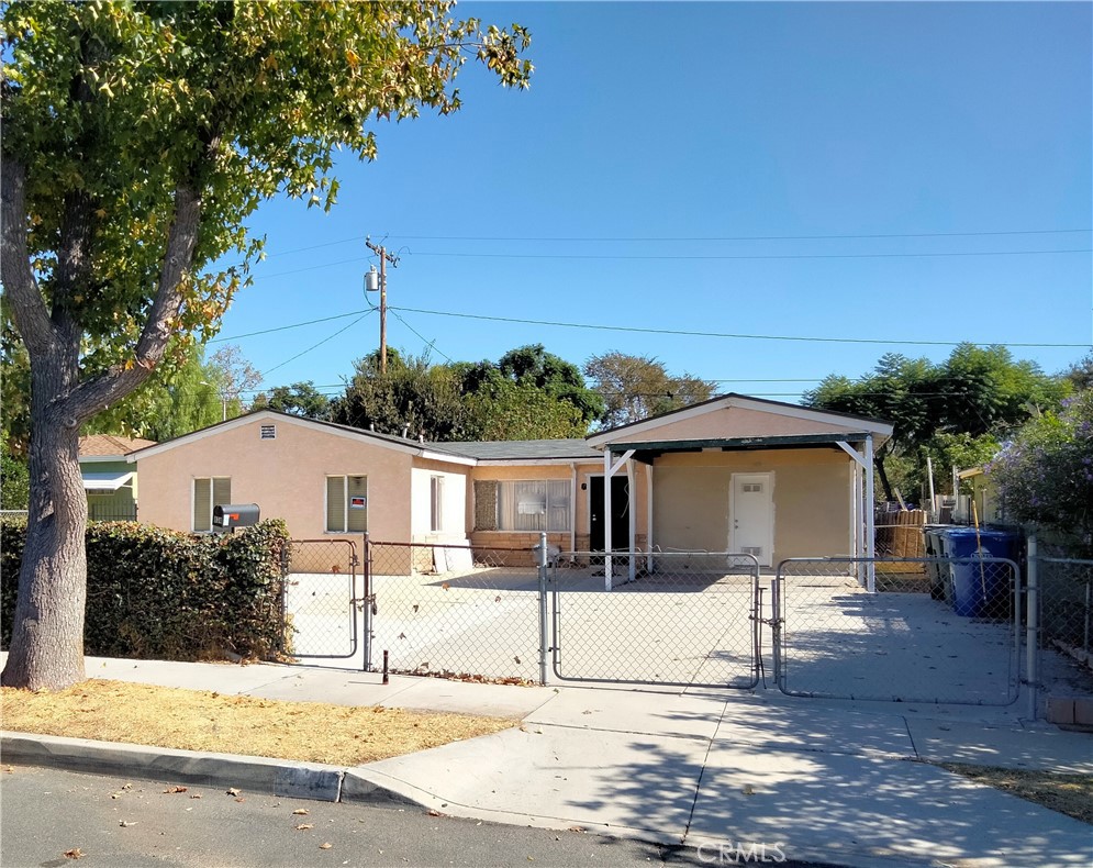 a view of a house with a street