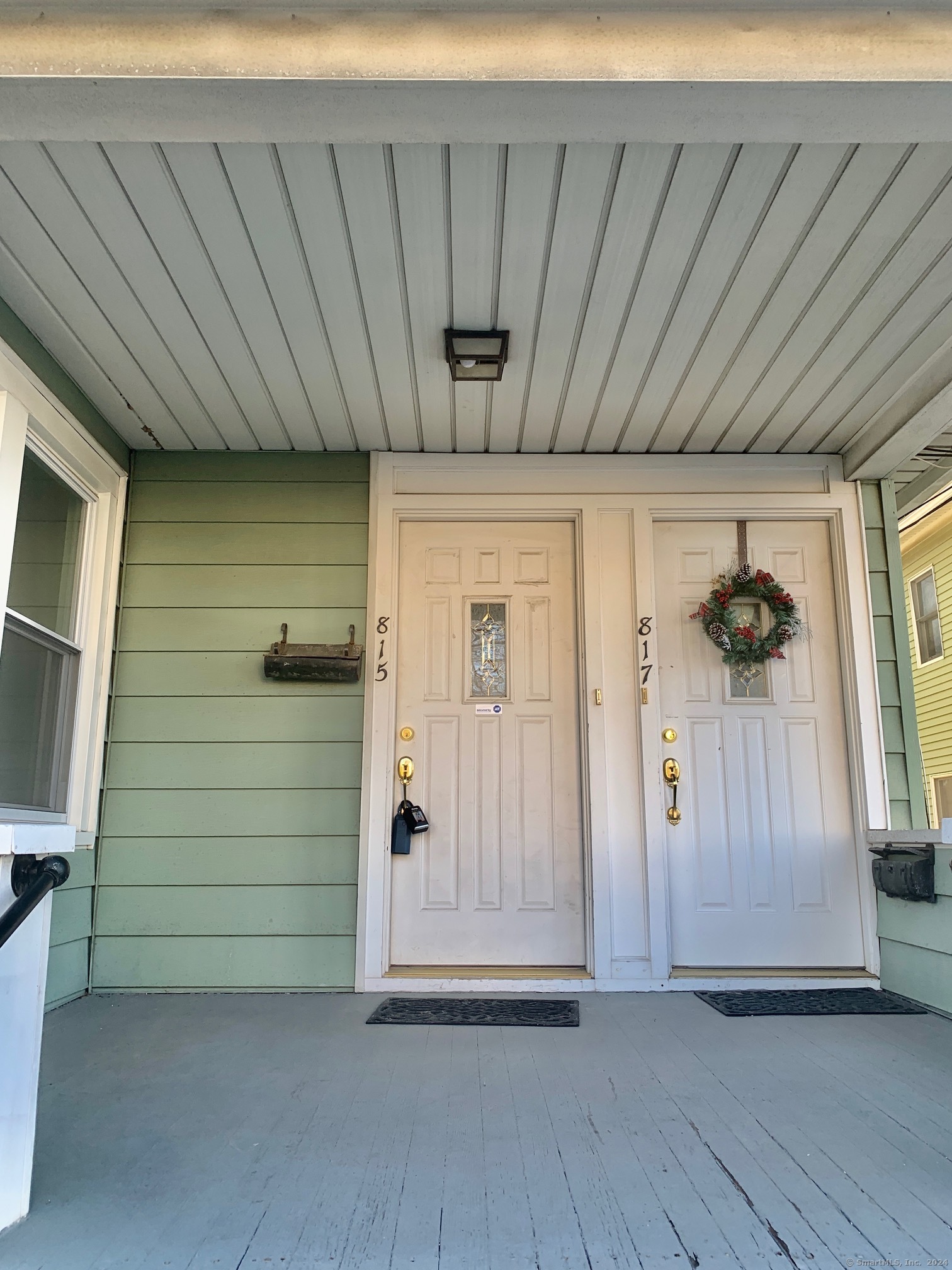 a view of a house with a wooden door