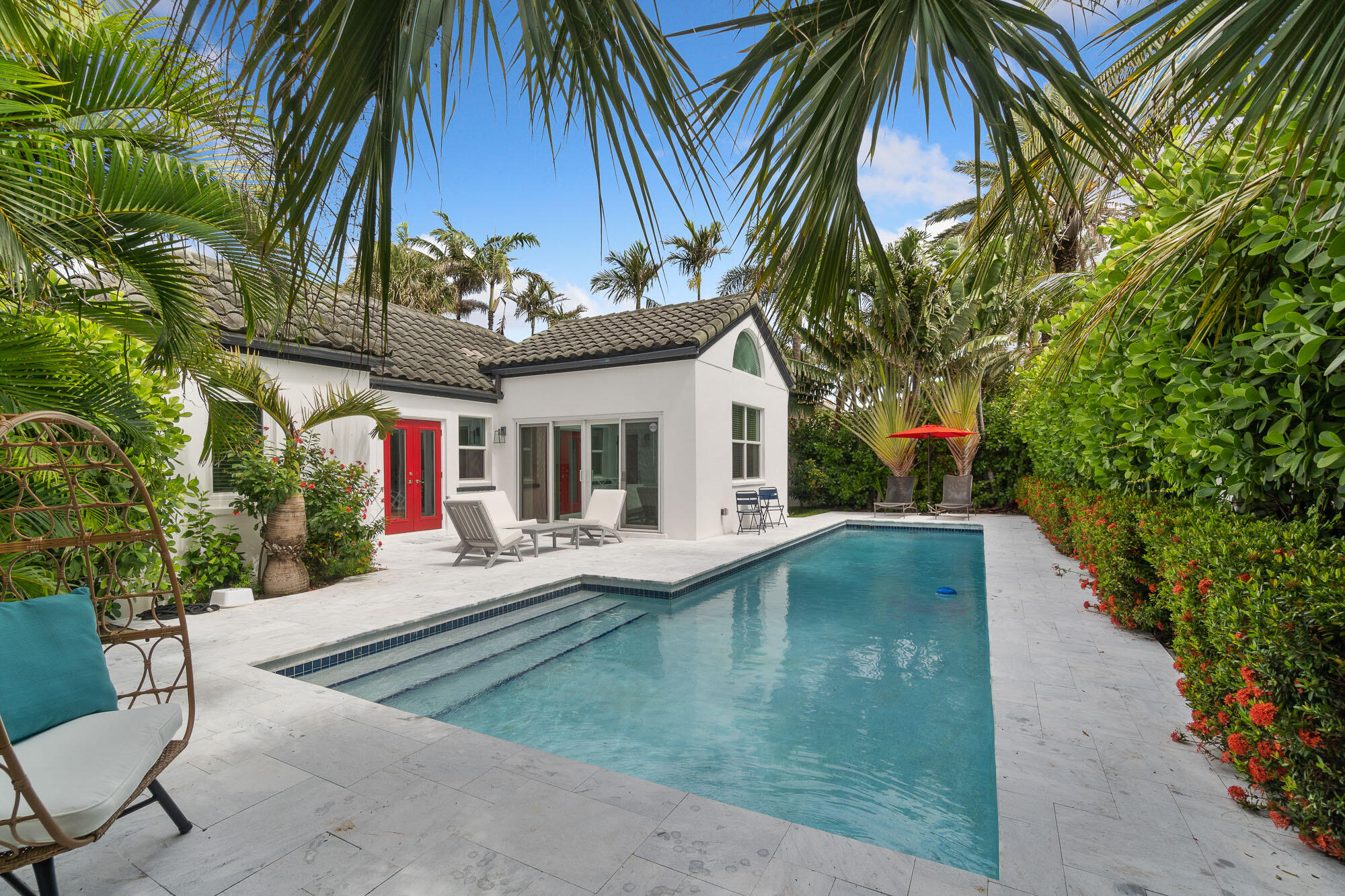 a view of swimming pool with a patio