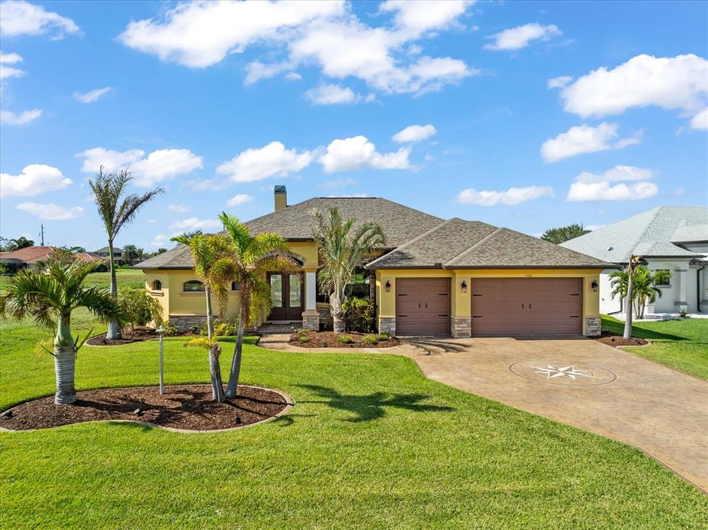 a front view of a house with a yard