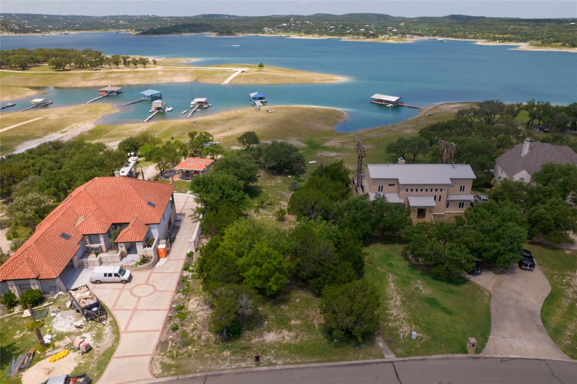 an aerial view of ocean with residential house and ocean view