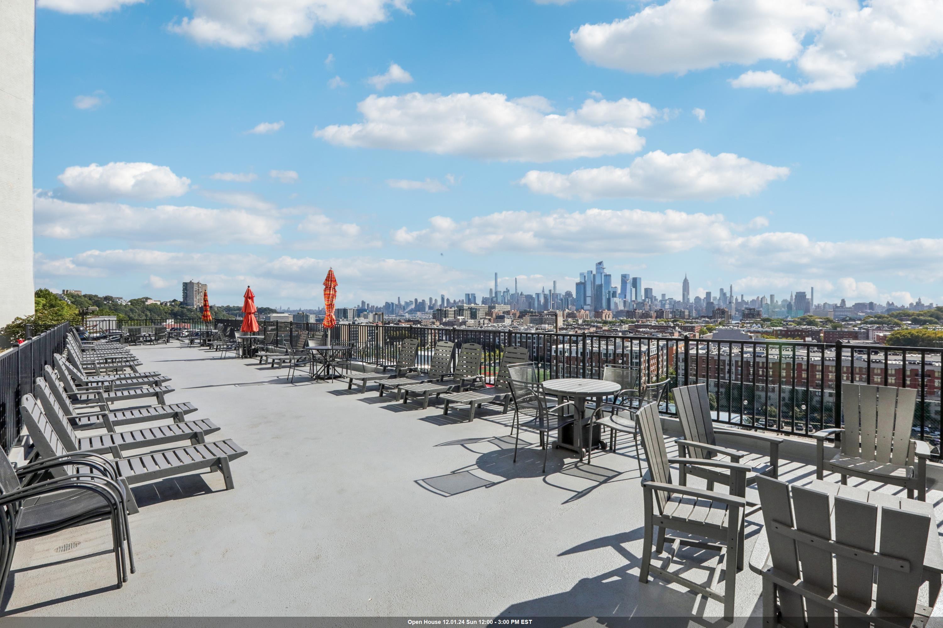 a view of roof deck with patio