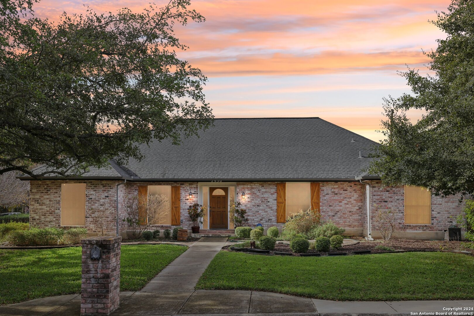 front view of a house with a yard