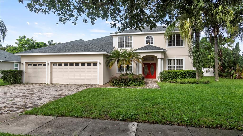 front view of a house with a yard