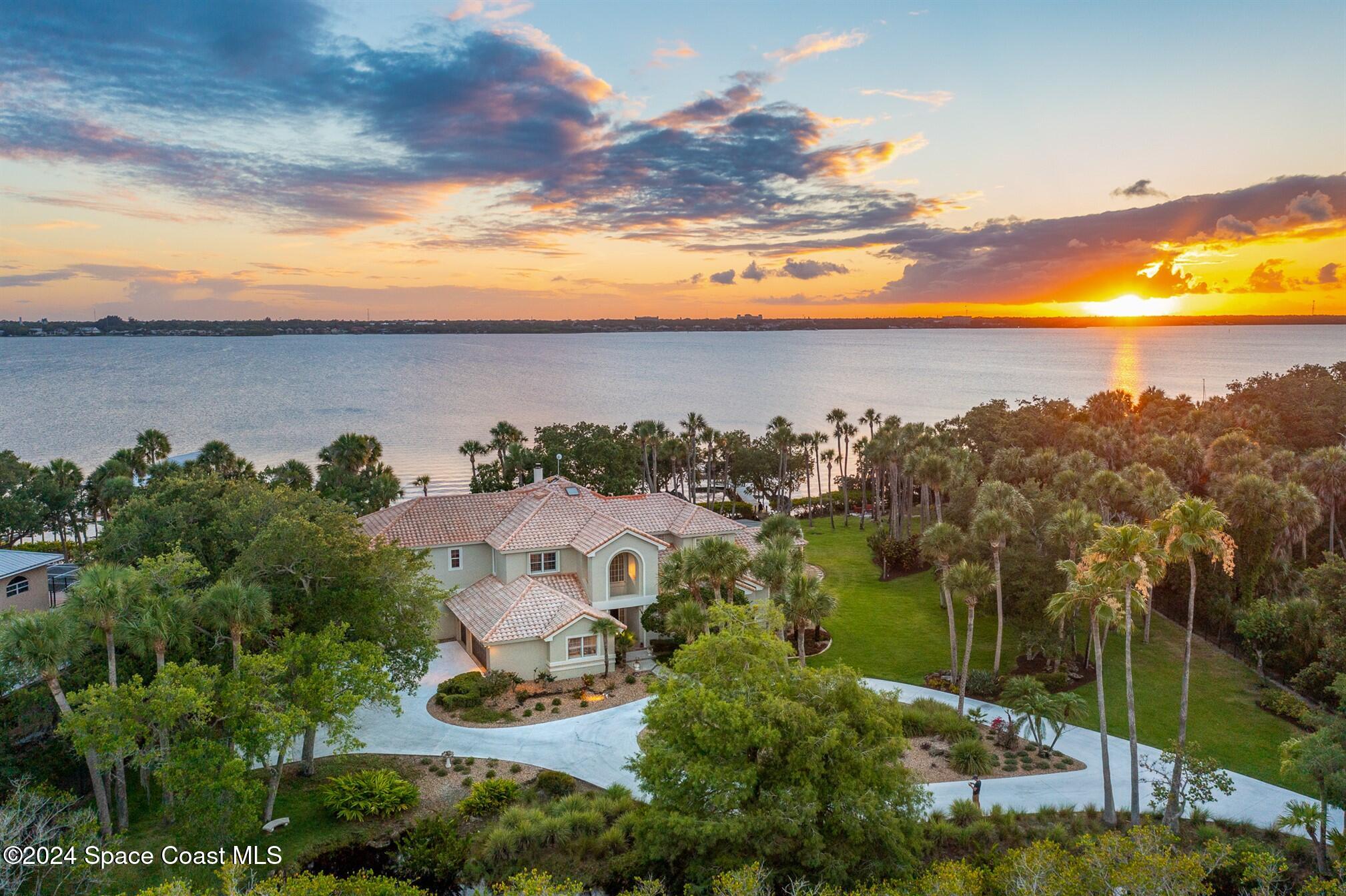 a view of a lake with a yard