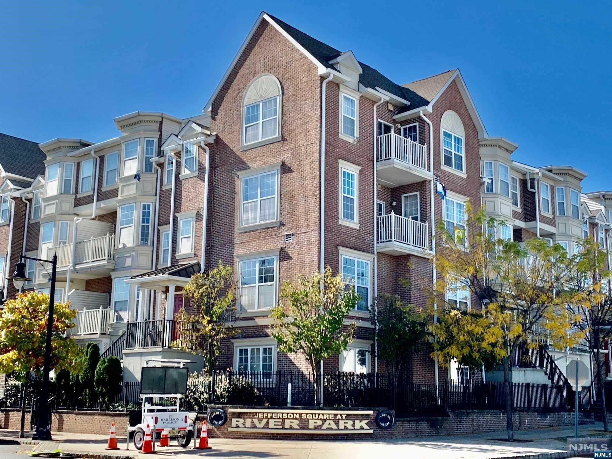 a front view of a building with street view