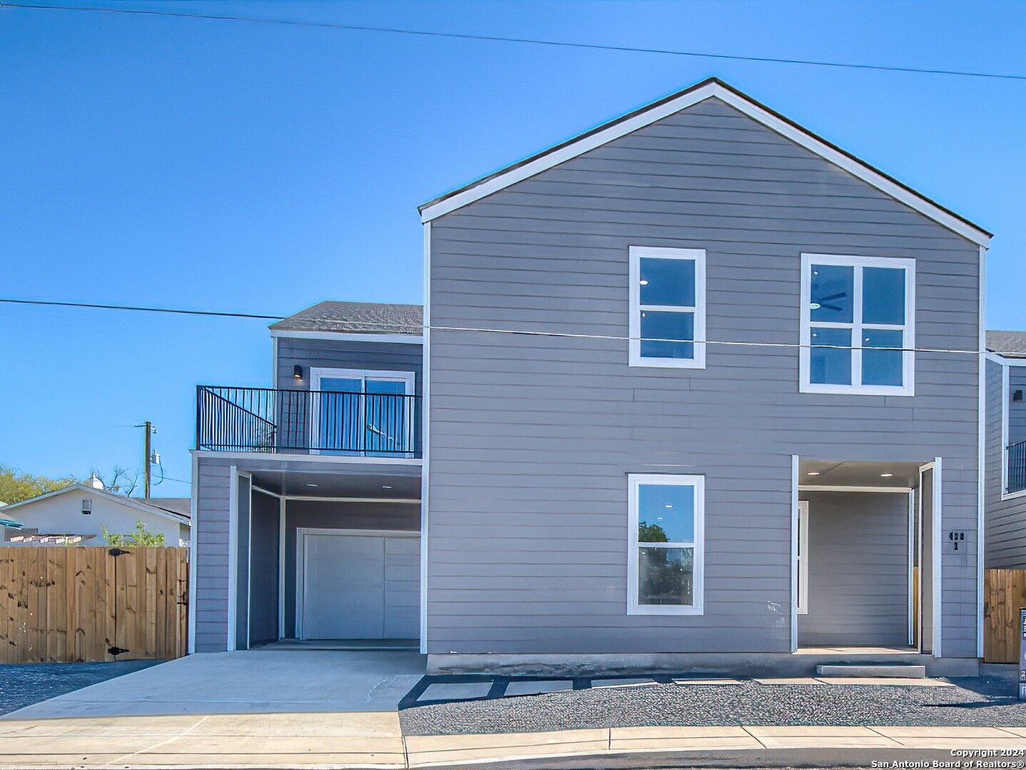 a front view of a house with a garage