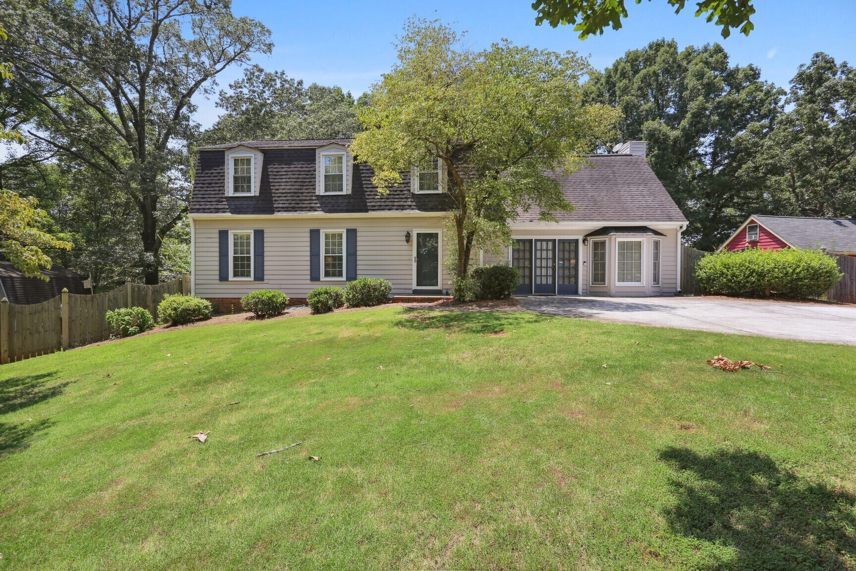 front view of a house with a yard