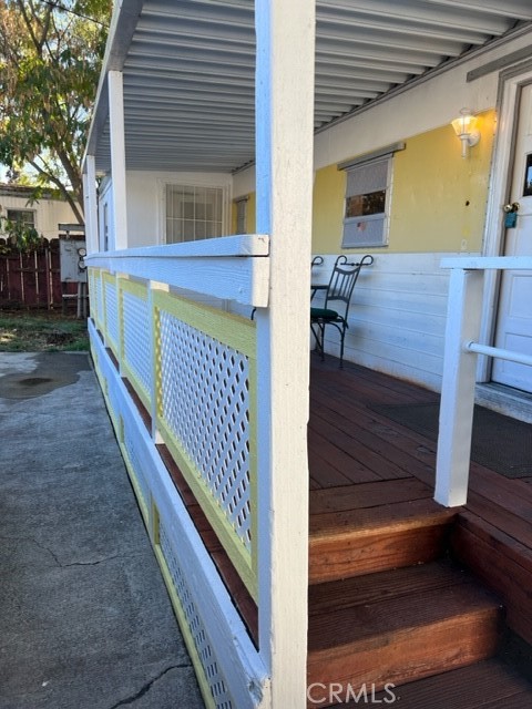 a view of balcony and wooden floor