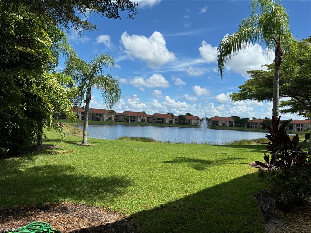 a view of a golf course with a lake