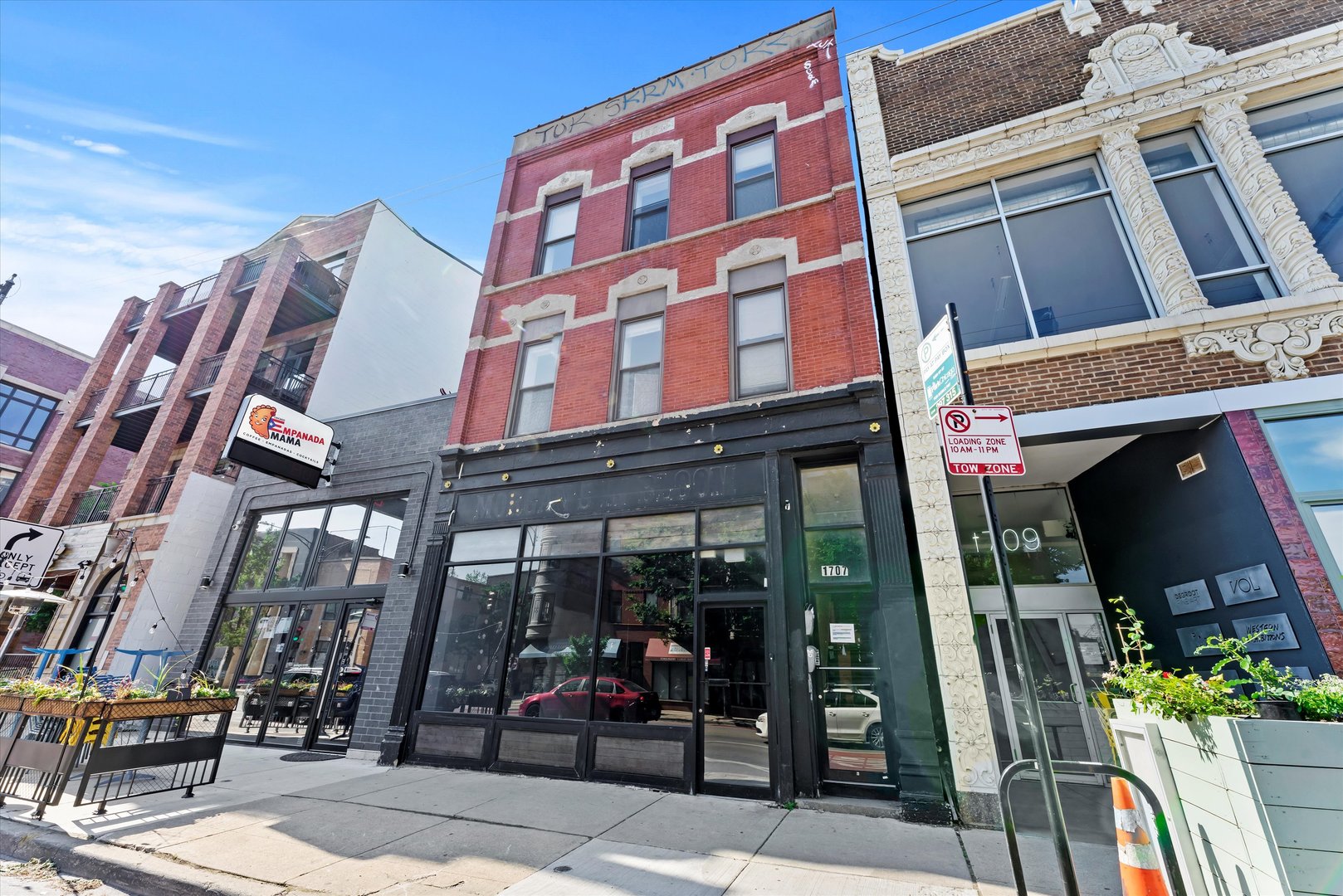 a view of a building with a porch