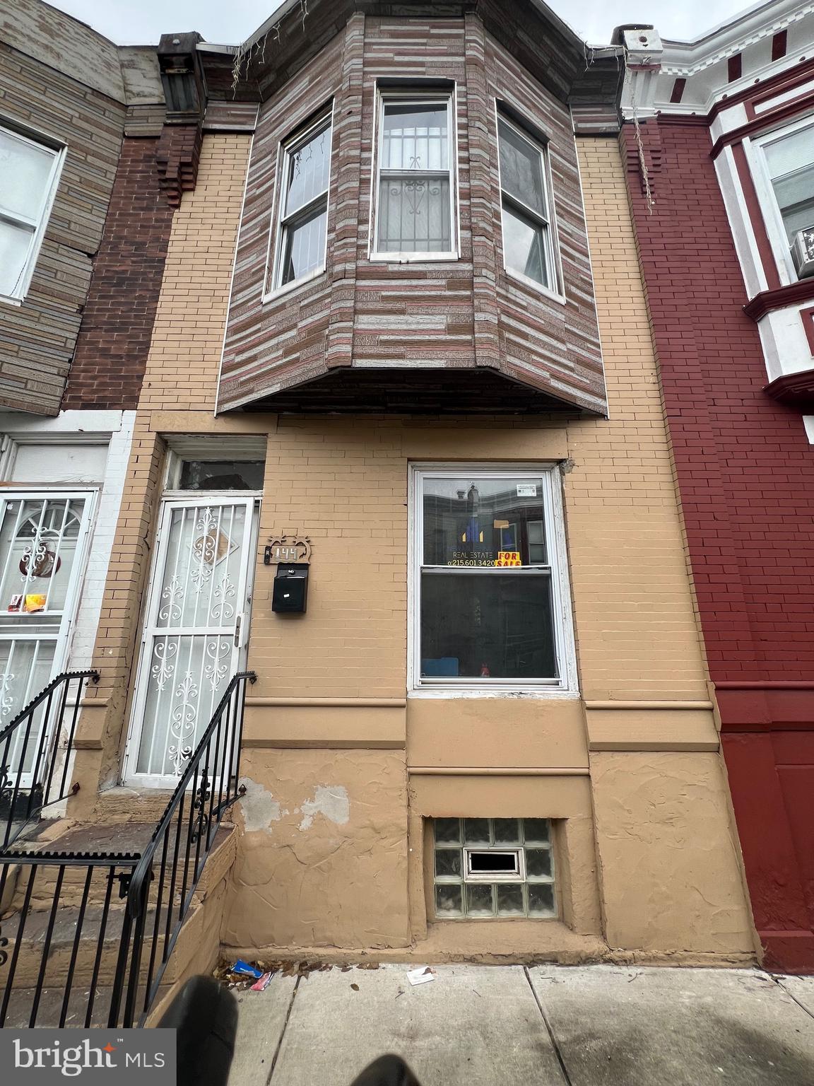 a view of a house with more windows and stairs