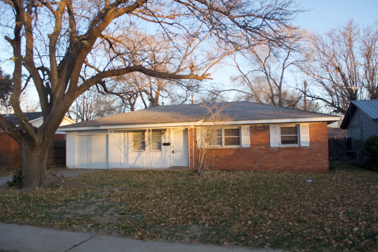 front view of house with a yard