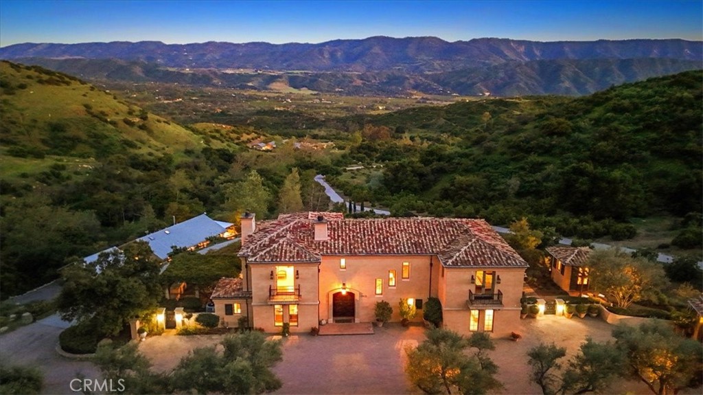 a view of a house with a mountain