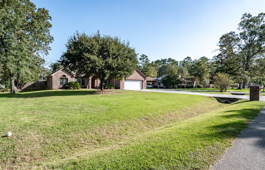 a view of a house with a big yard