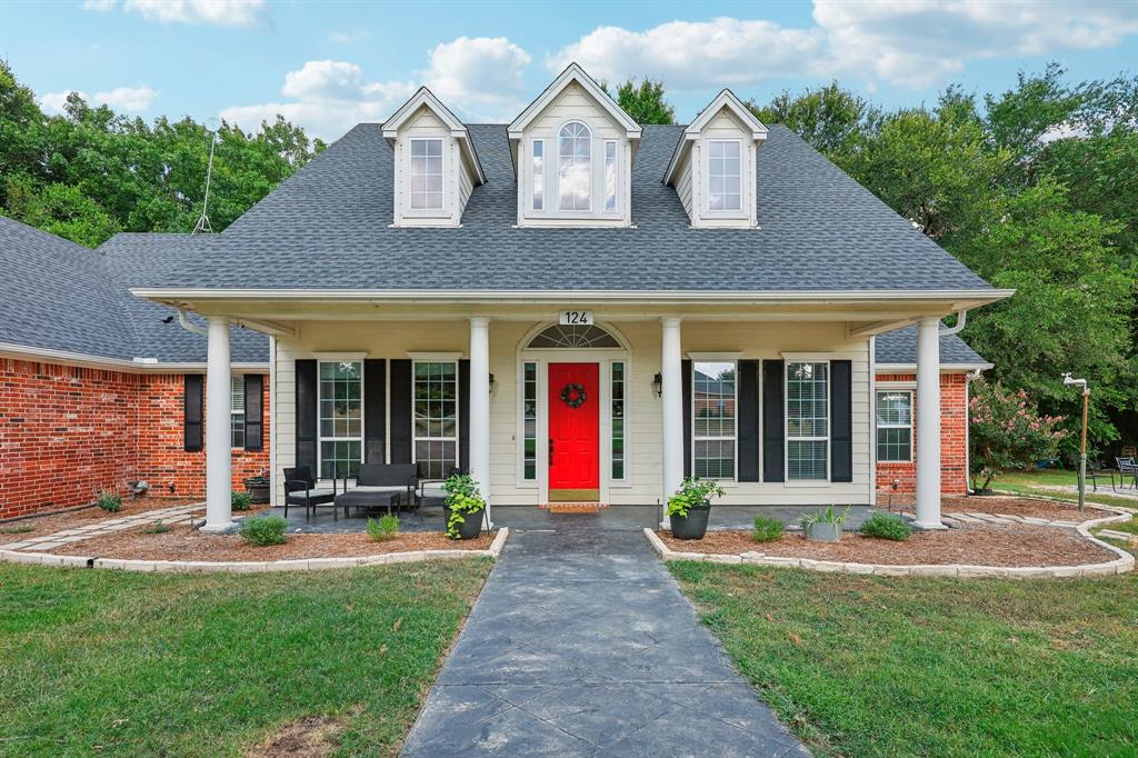 front view of a house with a yard