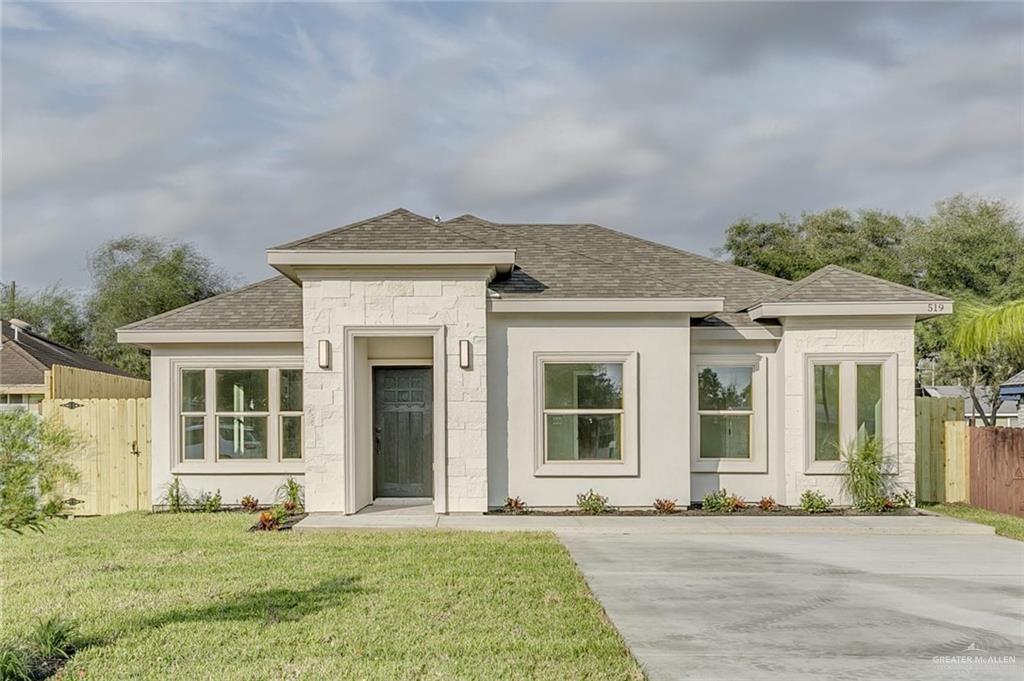 front view of a house with a yard