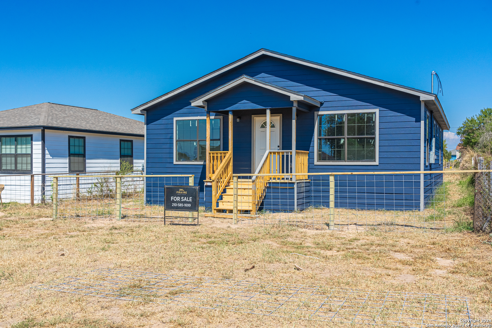 a view of house with outdoor space