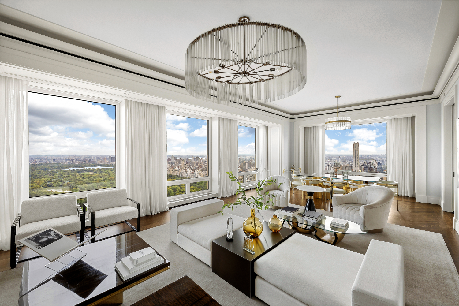 a living room with furniture and floor to ceiling windows