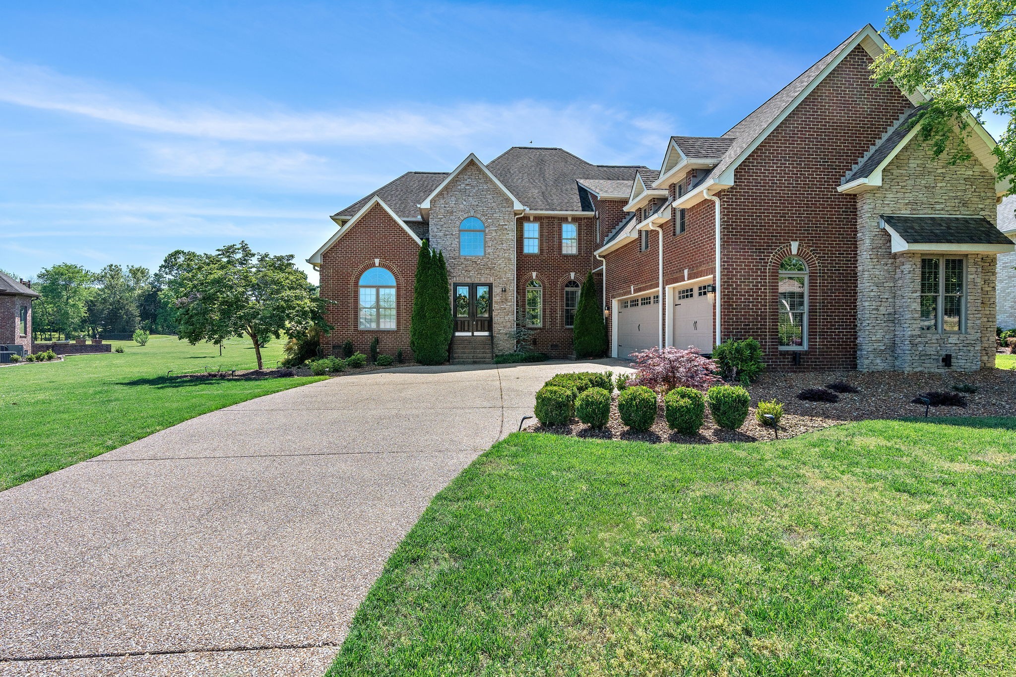 3 CAR GARAGE* LONG DRIVEWAY FOR PLENTY OF PARKING SPACE* 2 ENTRANCES INTO HOME AT THE FRONT AND SIDE*