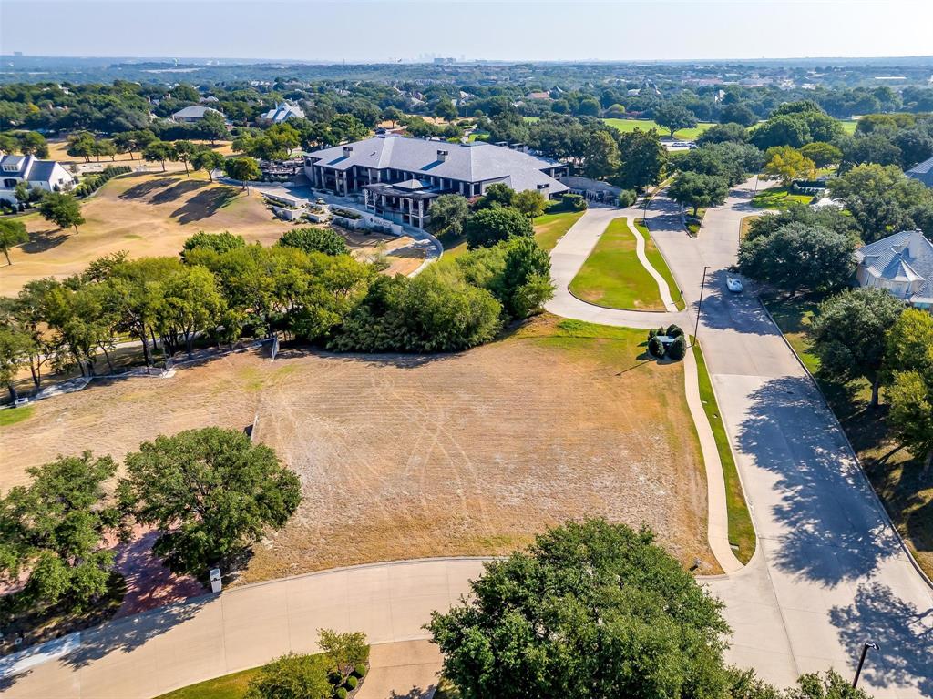 an aerial view of residential house with outdoor space and swimming pool