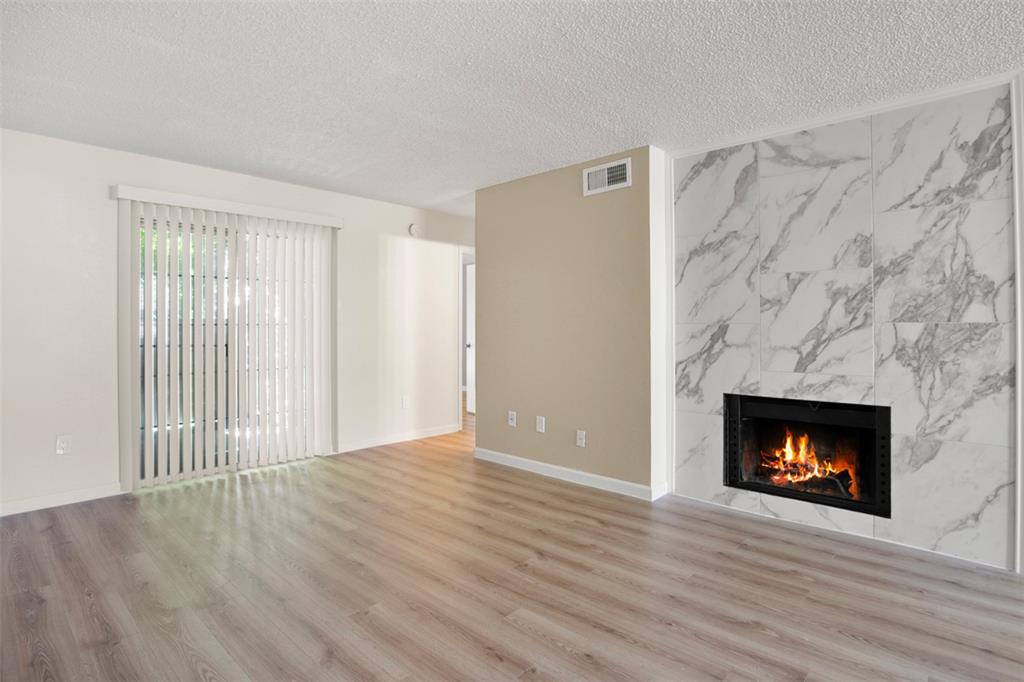 a view of a livingroom with a fireplace