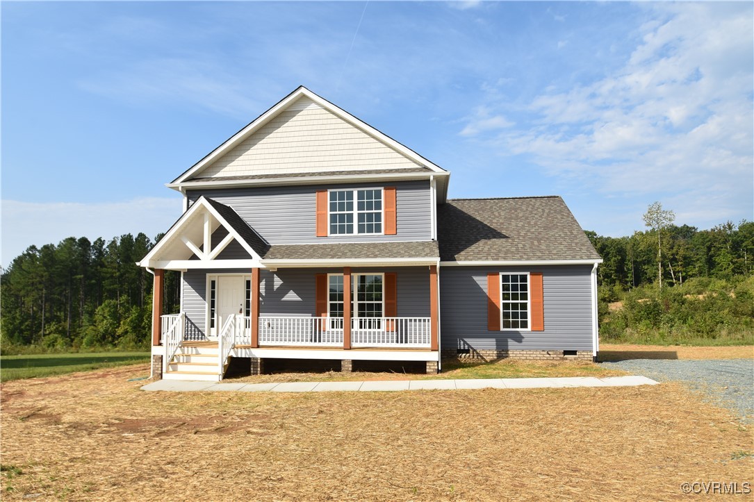 front view of a house with a yard