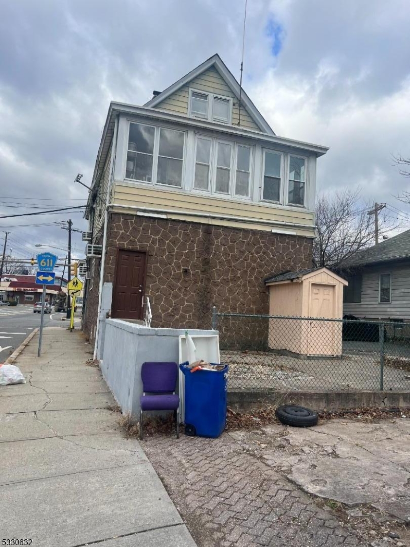 a front view of a house with parking space