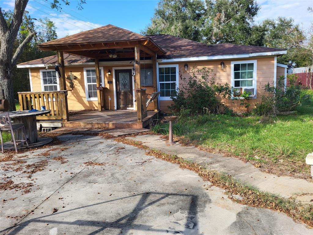 a view of house with a patio