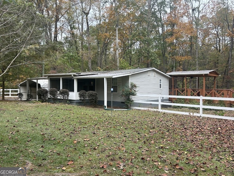 a house with trees in the background