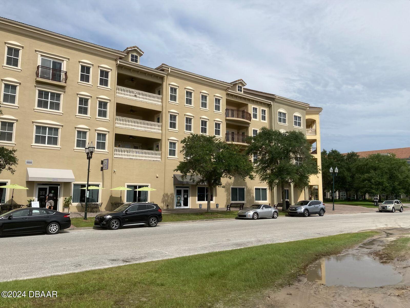 a view of a building with street view