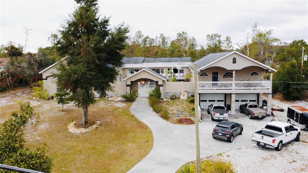 a view of a house with a swimming pool