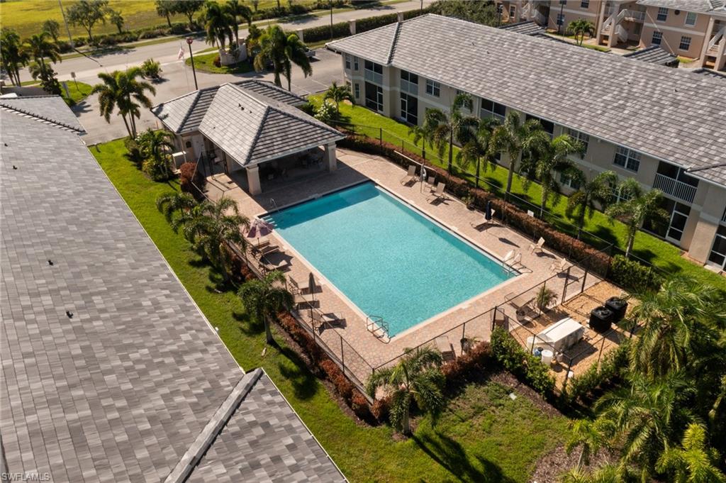 View of swimming pool featuring a gazebo and a patio