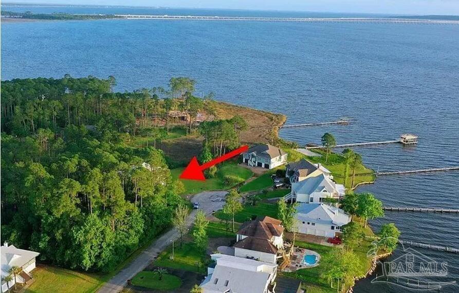 a aerial view of a house with a yard