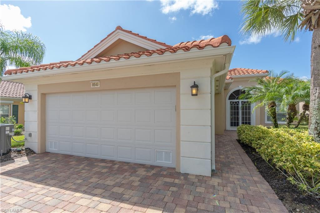 a view of a house with a garage