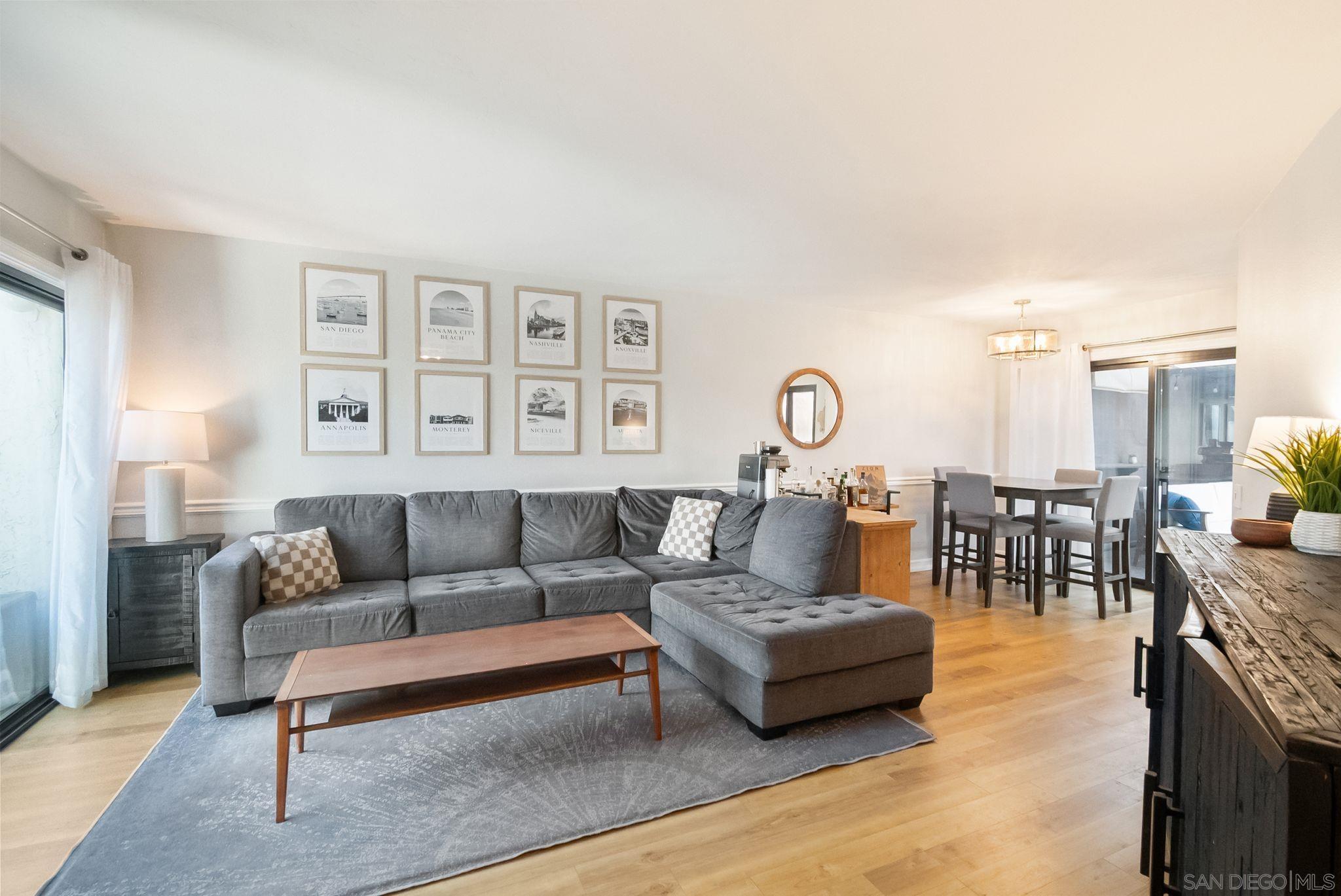 a living room with furniture and a table