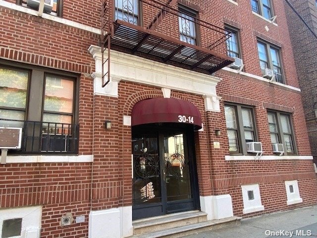 a view of a brick building with a window