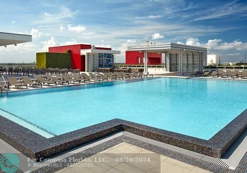 a view of a swimming pool and outdoor space