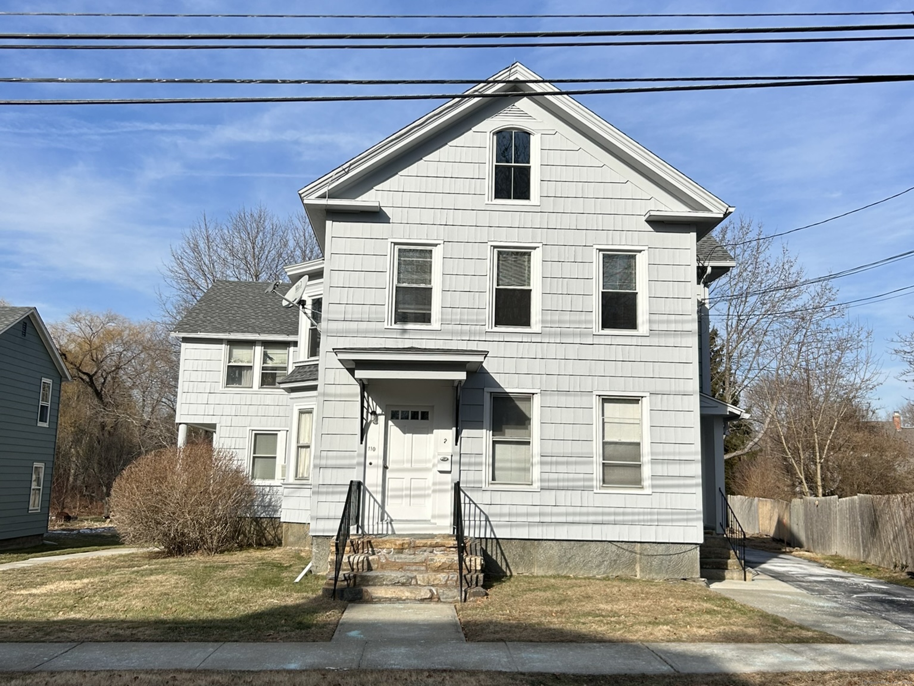 a front view of a house with garage