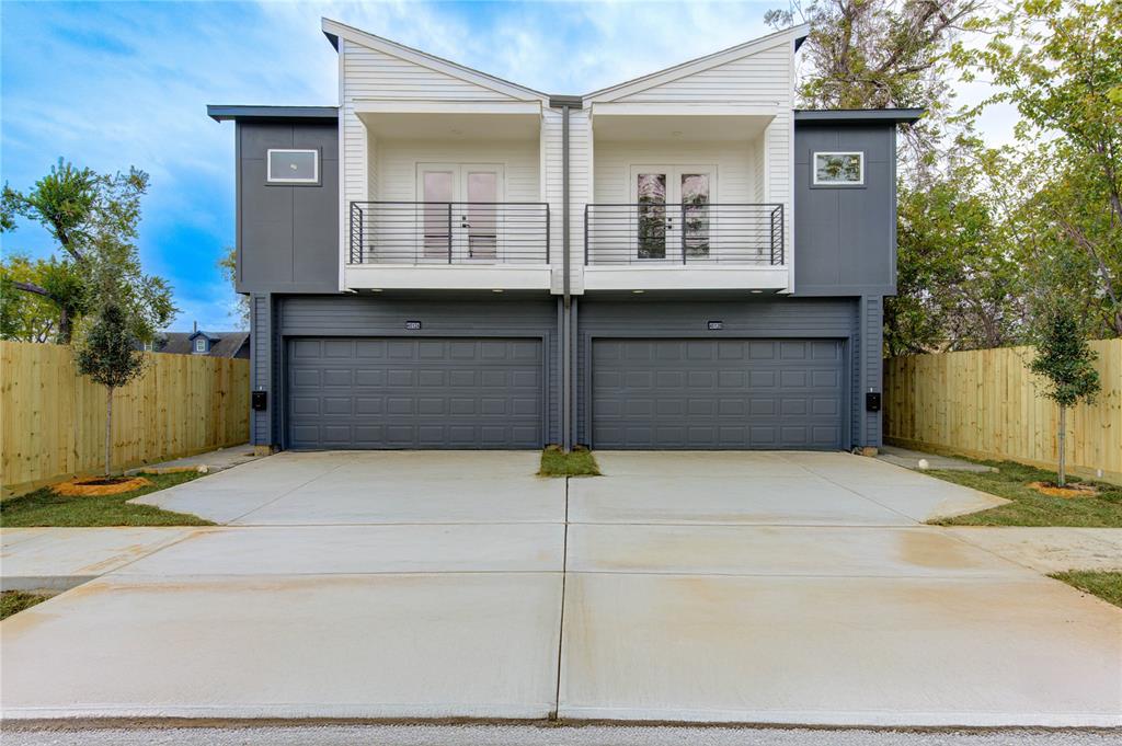 a front view of a house with a garage