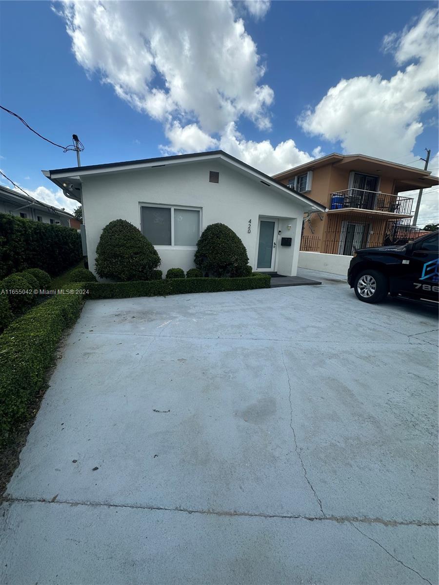 a view of a house with a patio