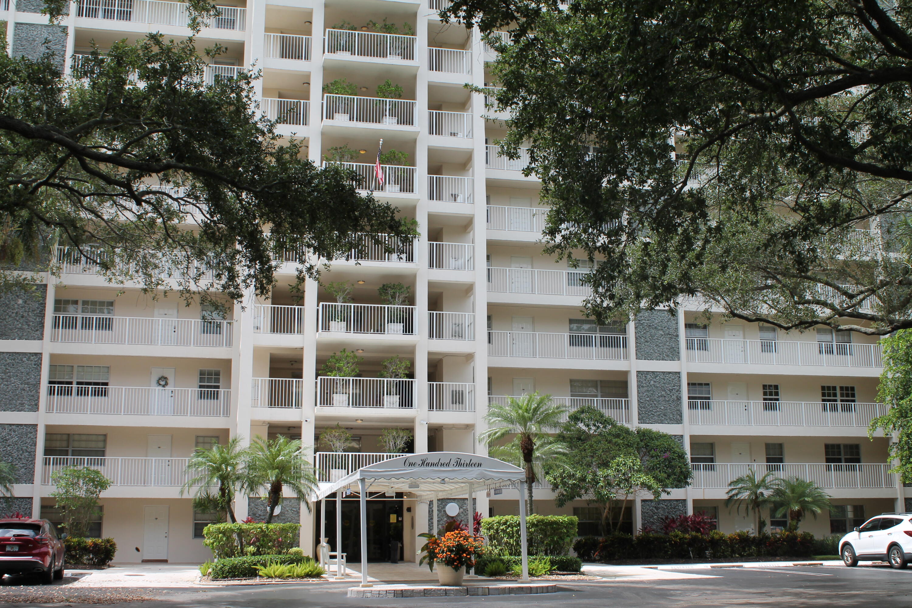 a front view of a building with street view