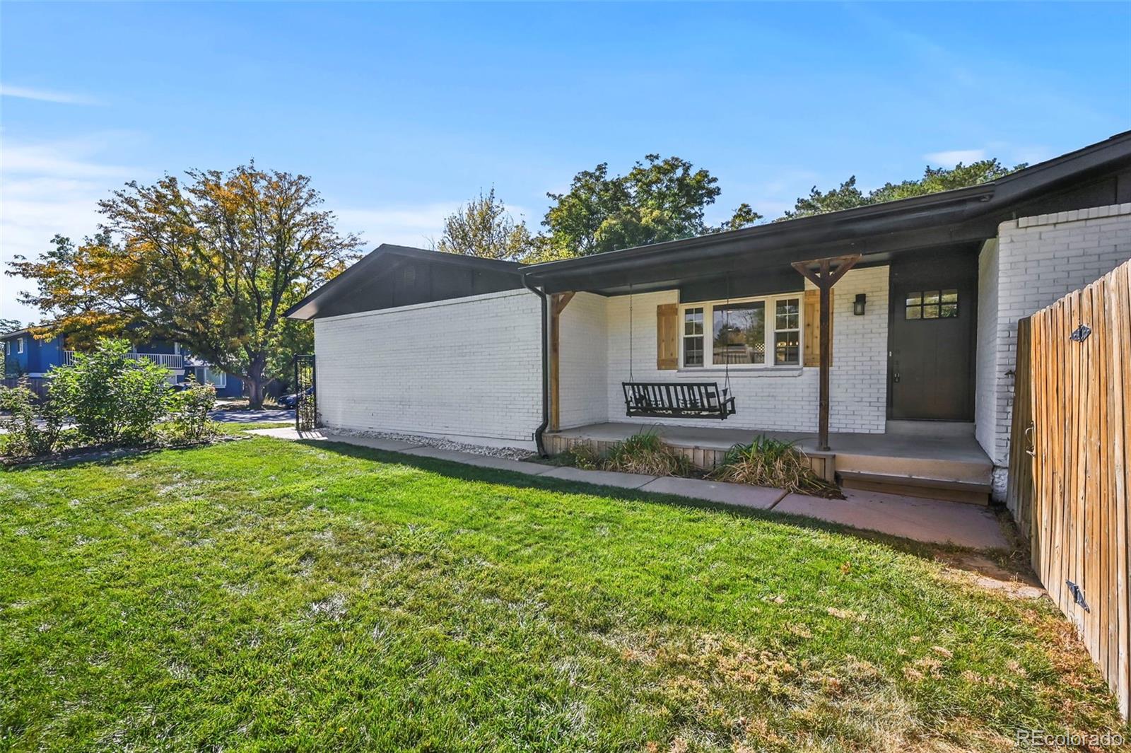 front view of house with a yard