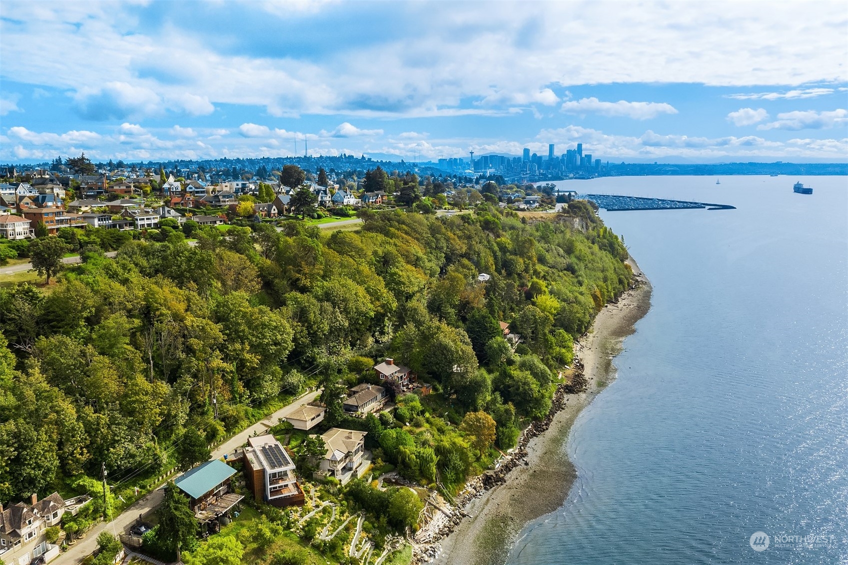 a view of a lake with a city