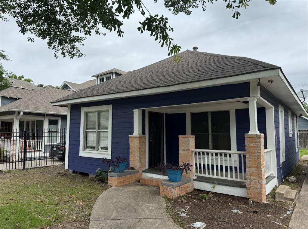 a front view of a house with a porch