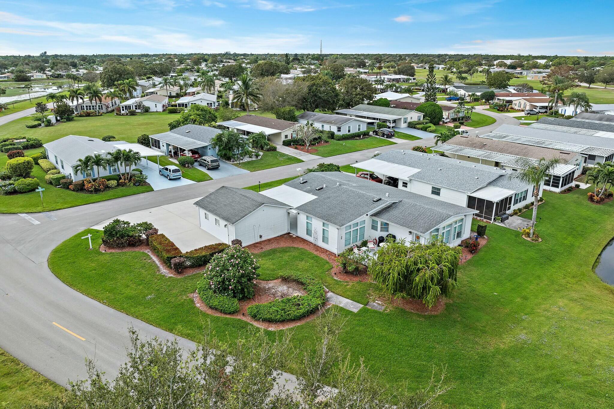 an aerial view of a house with a garden