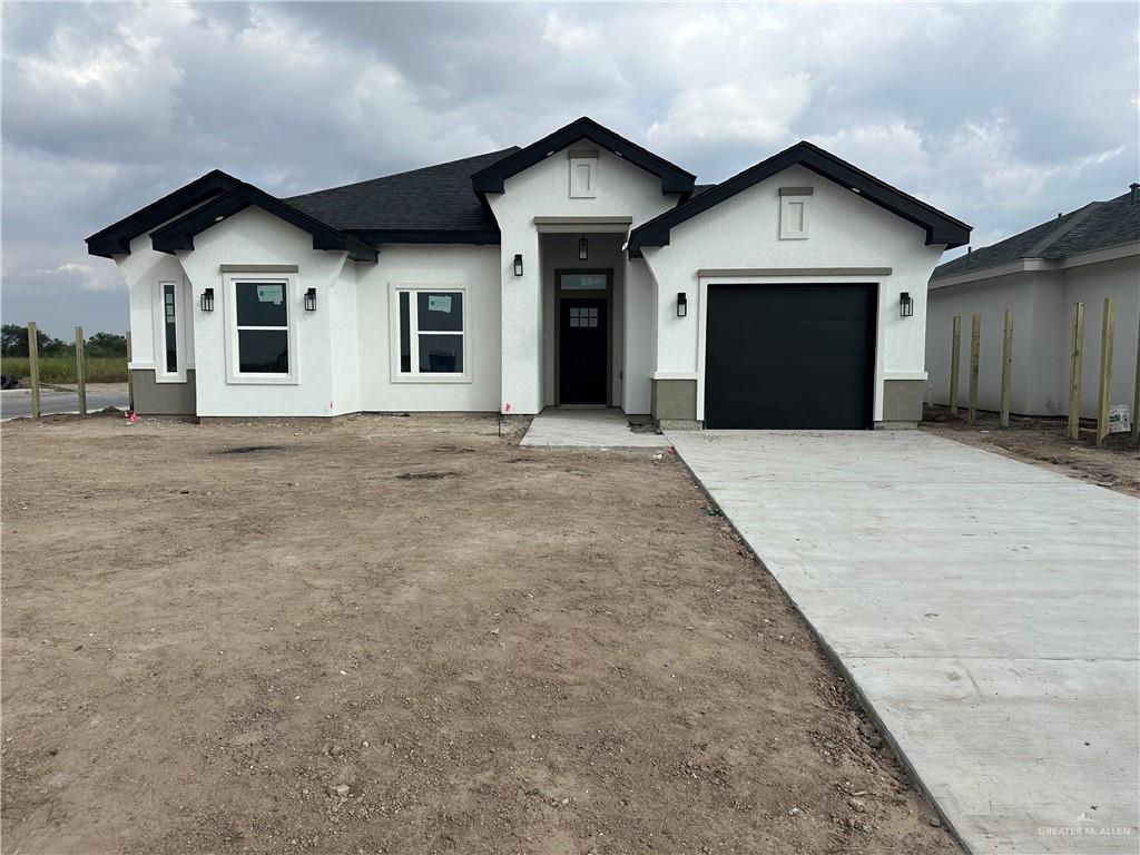 front view of a house with a garage