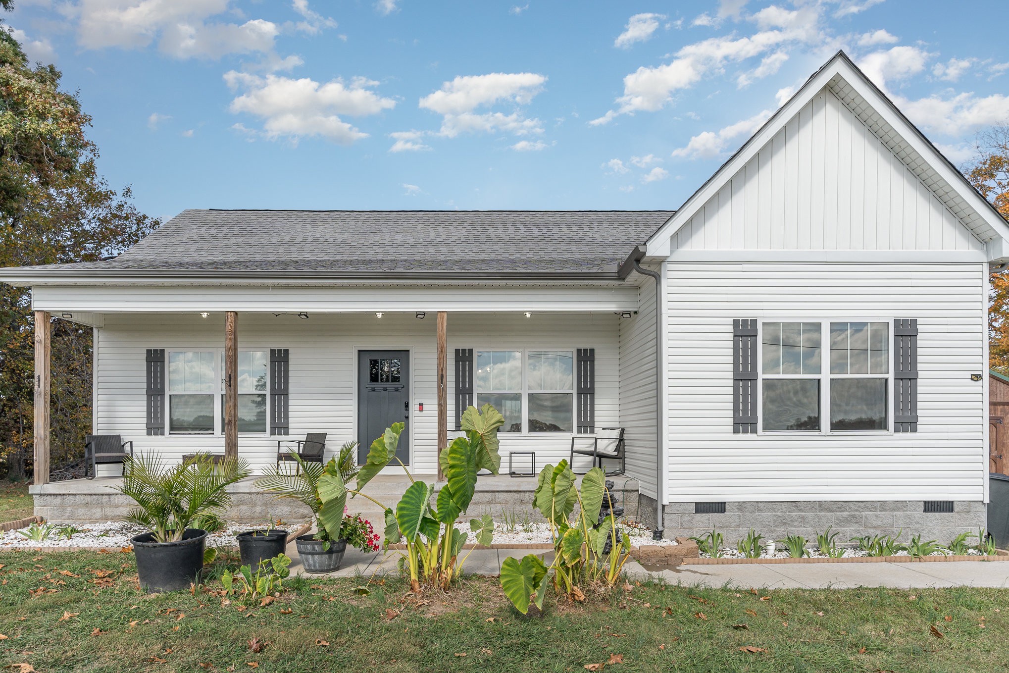 a view of house with patio outdoor seating