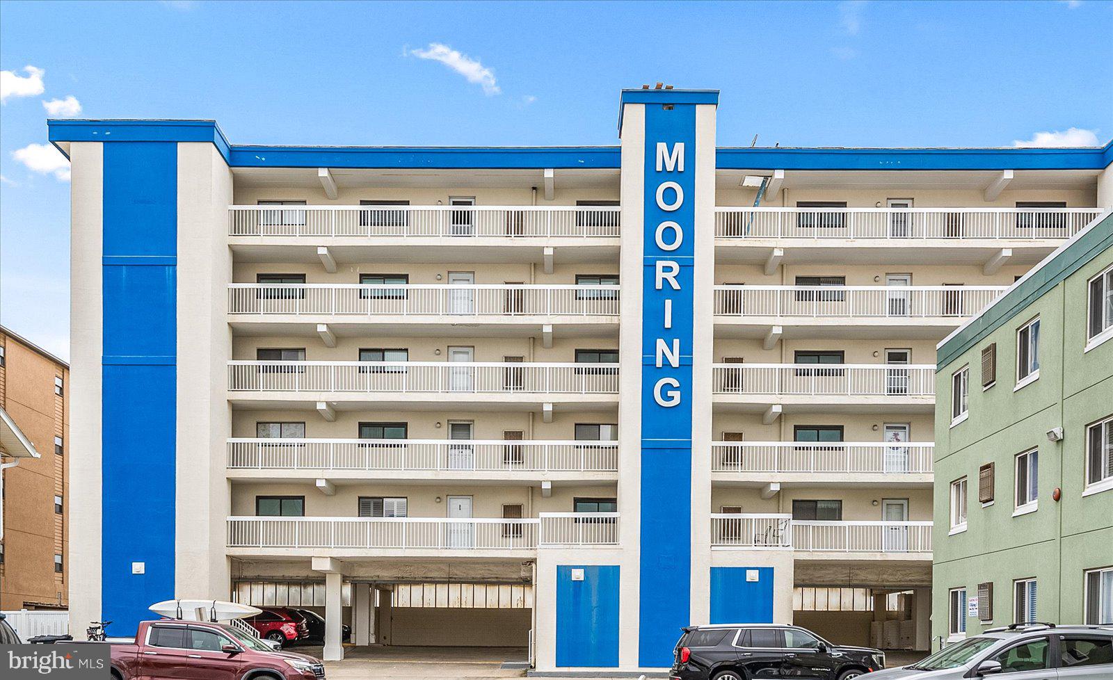 a front view of a building with a street