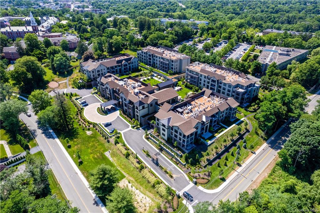 an aerial view of a house with a garden